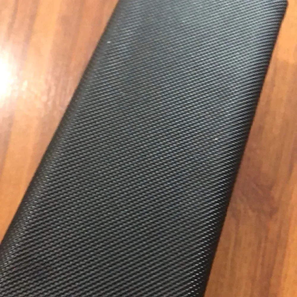 Nicole Miller Black hard triangular eyeglass case.